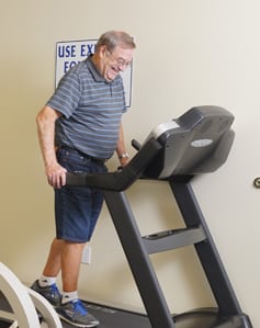 senior man using treadmill